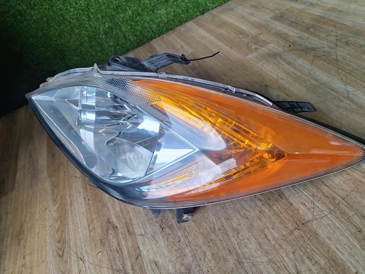 1000885060-Left Headlamp Top