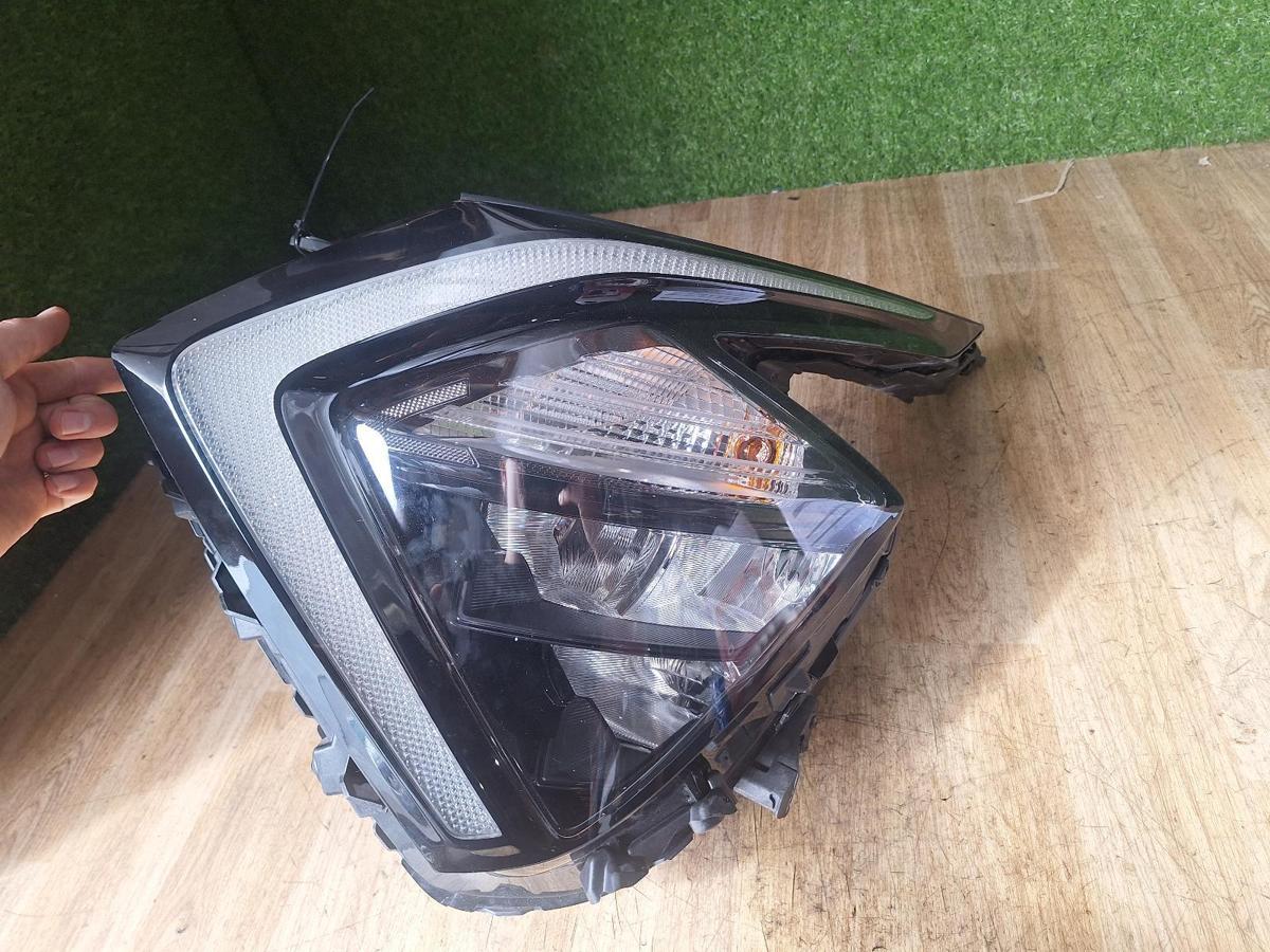 1000887344-Left Headlamp Top