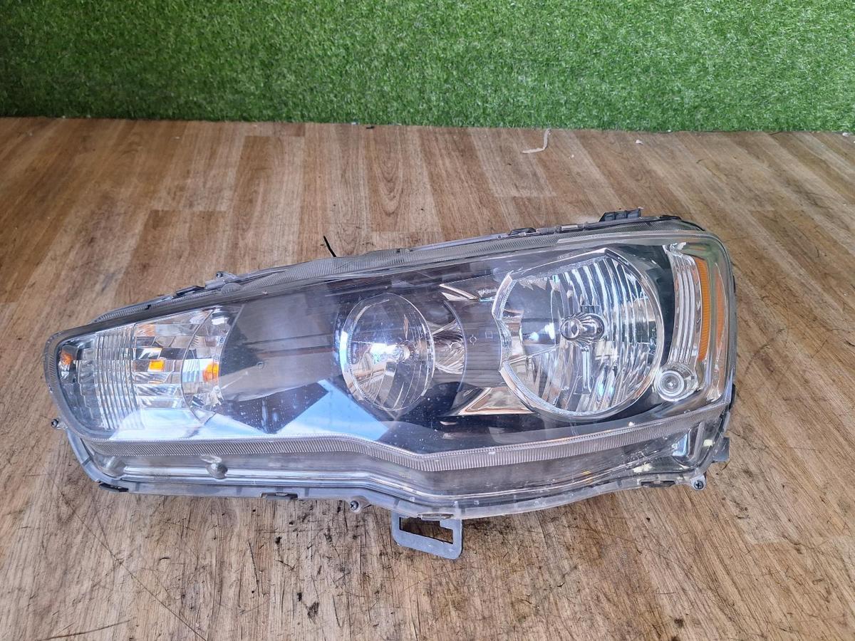 1000911003-Left Headlamp Top