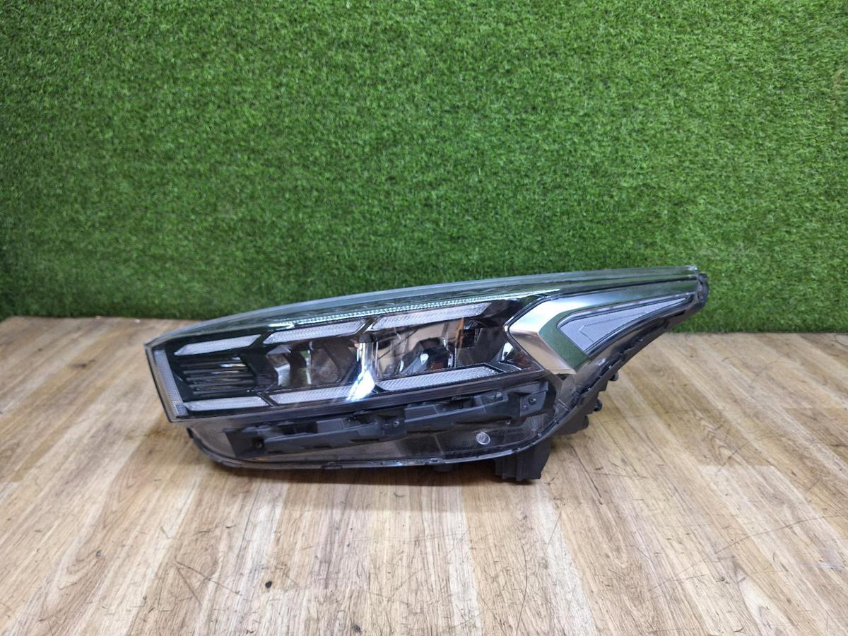 1000939333-Left Headlamp Top