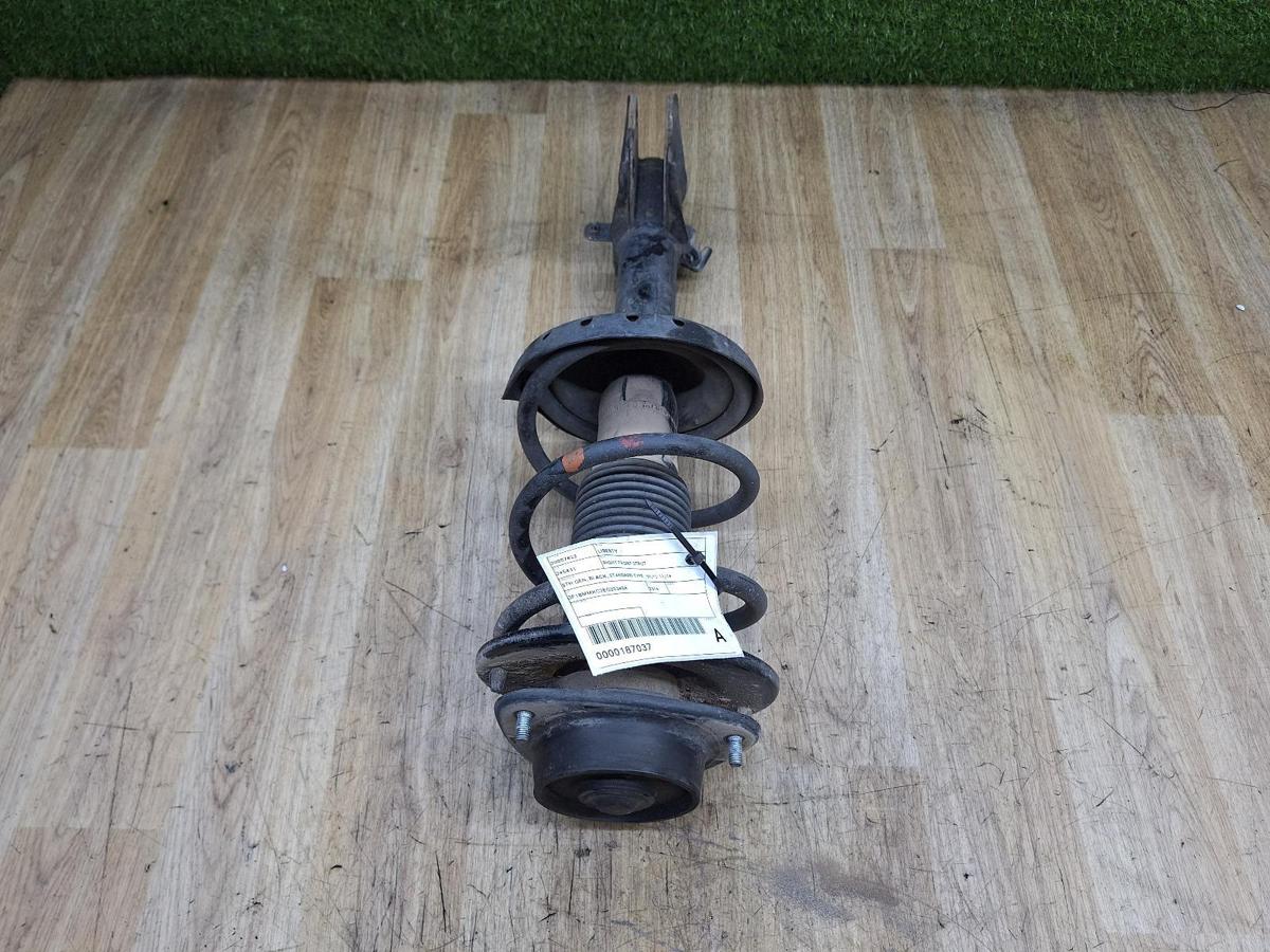 1000932413-Right Front Strut Top