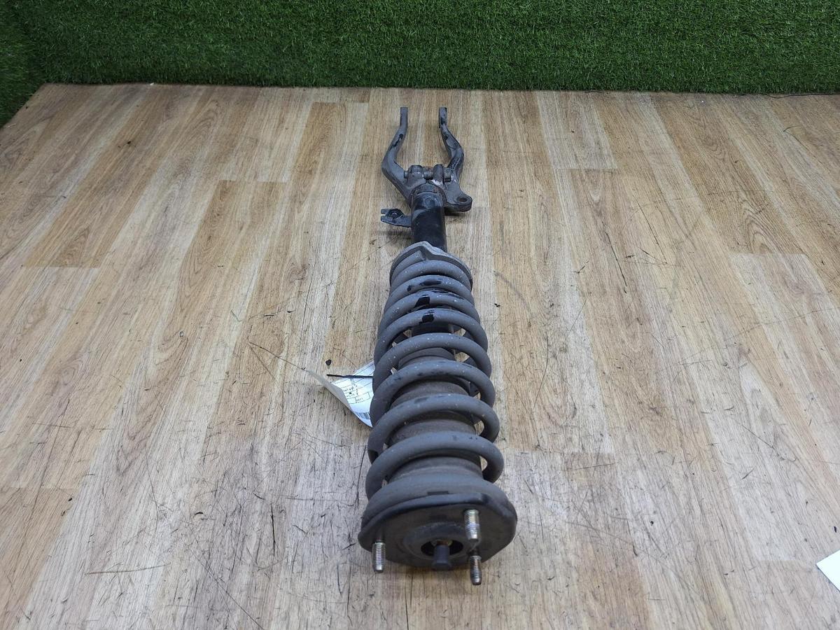 1000934700-Right Front Strut Top