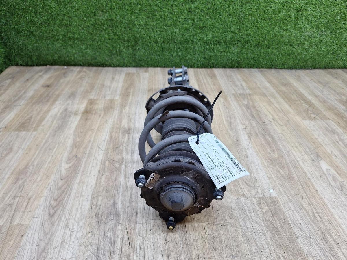1000939424-Right Front Strut Top