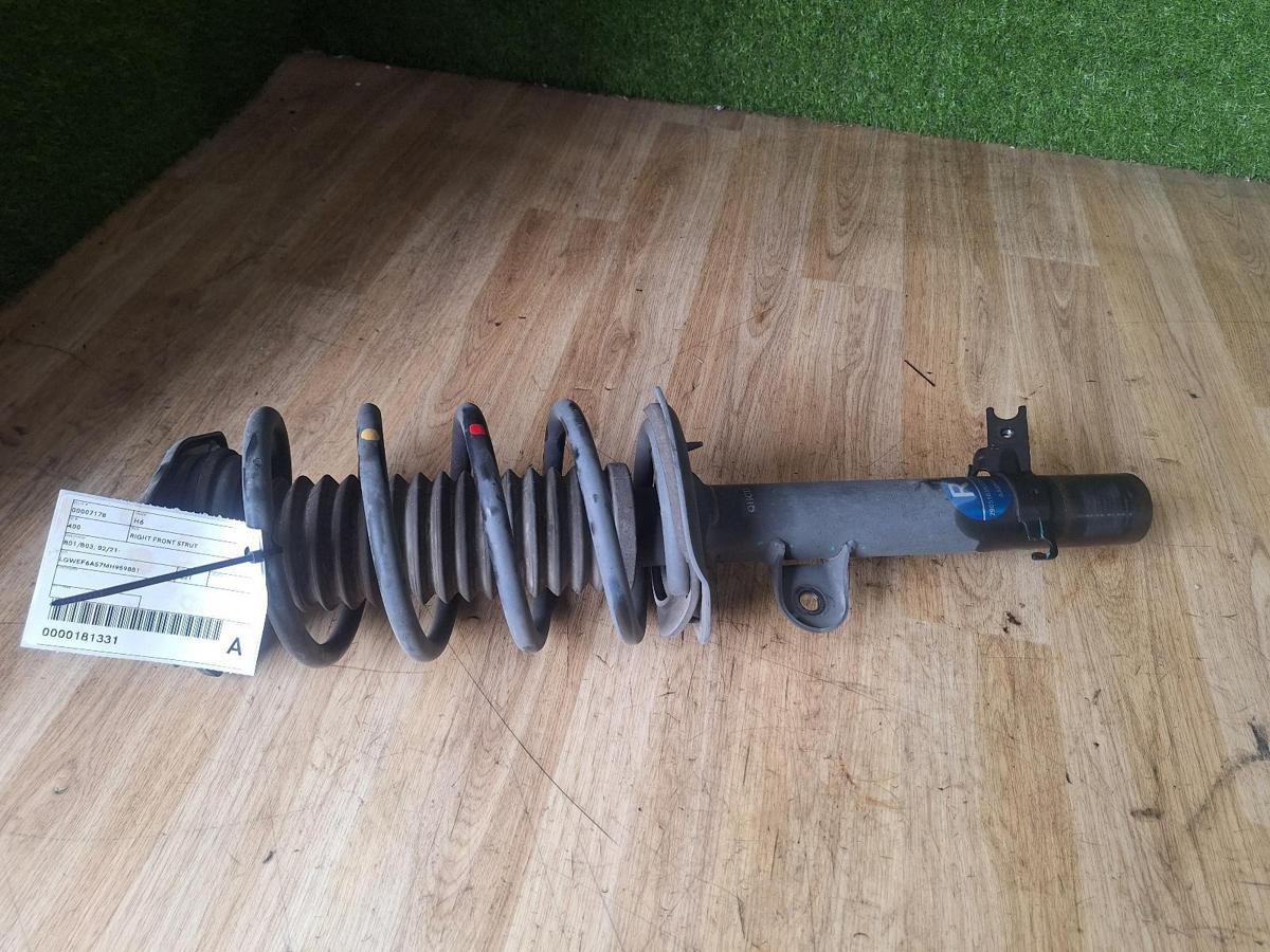 1000899996-Right Front Strut Top
