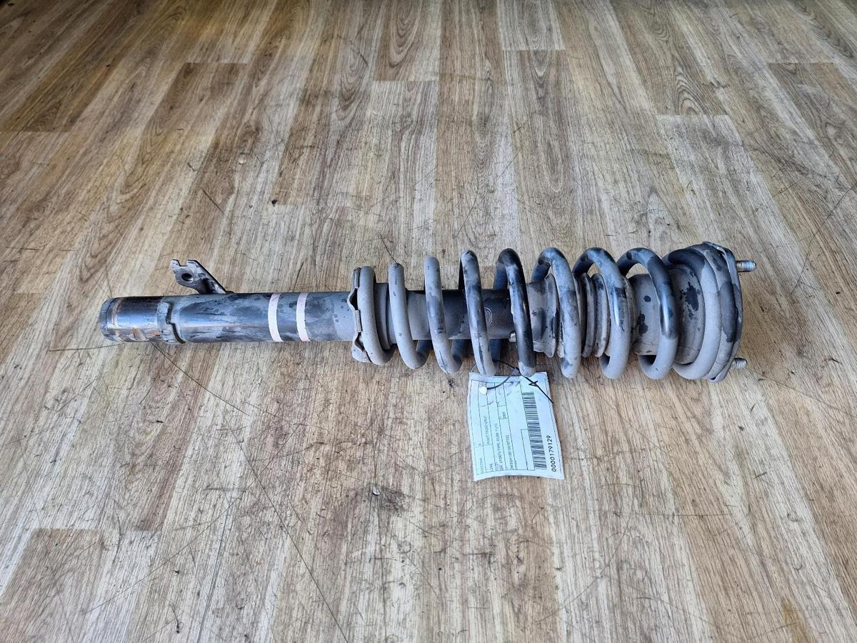 1000892507-Right Front Strut Top