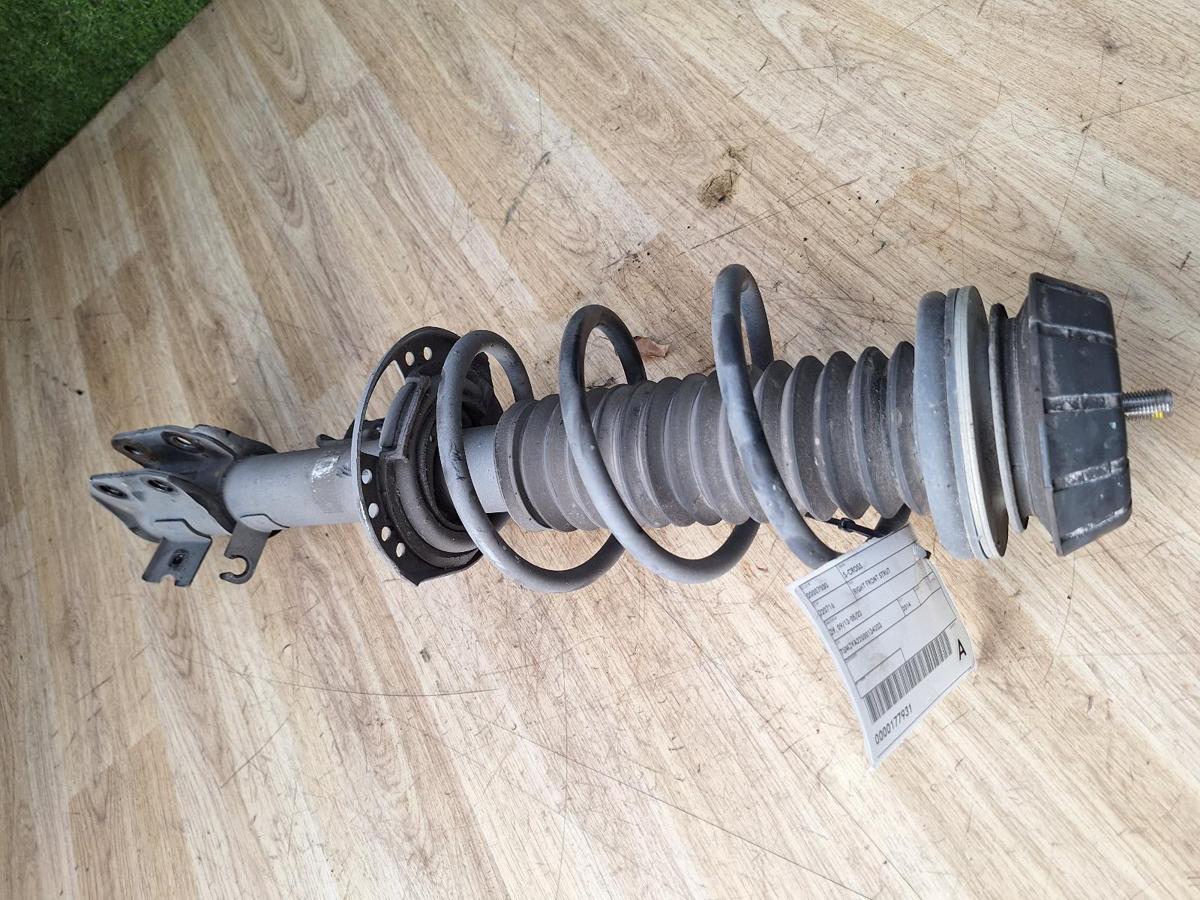 1000885001-Right Front Strut Top