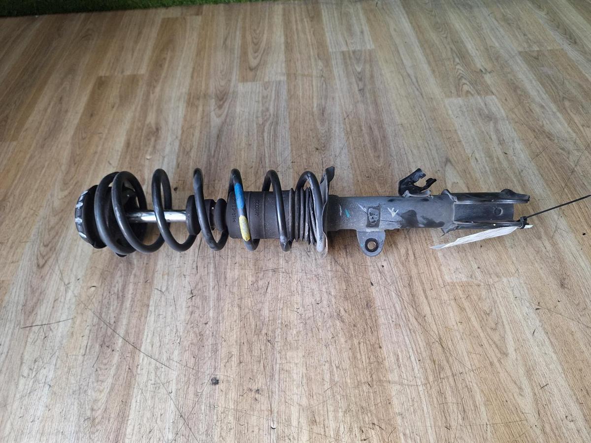 1000889011-Right Front Strut Top