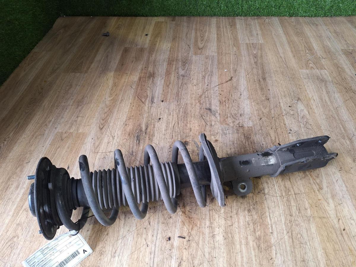 1000890318-Right Front Strut Top