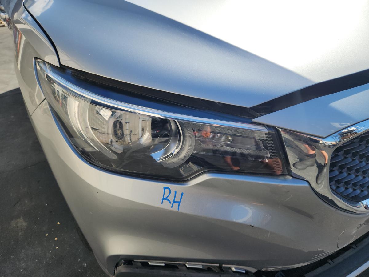 1000934205-Right Headlamp