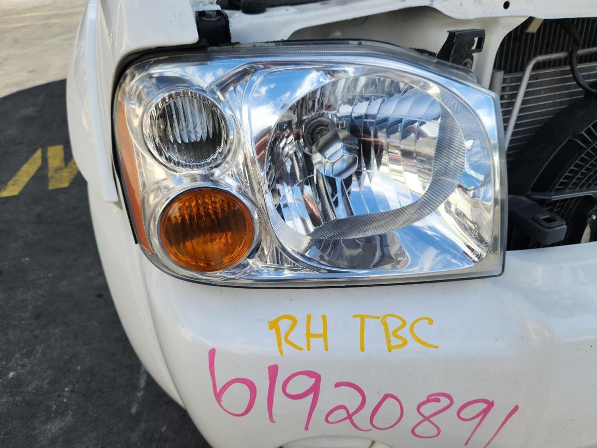 1000843805-Right Headlamp