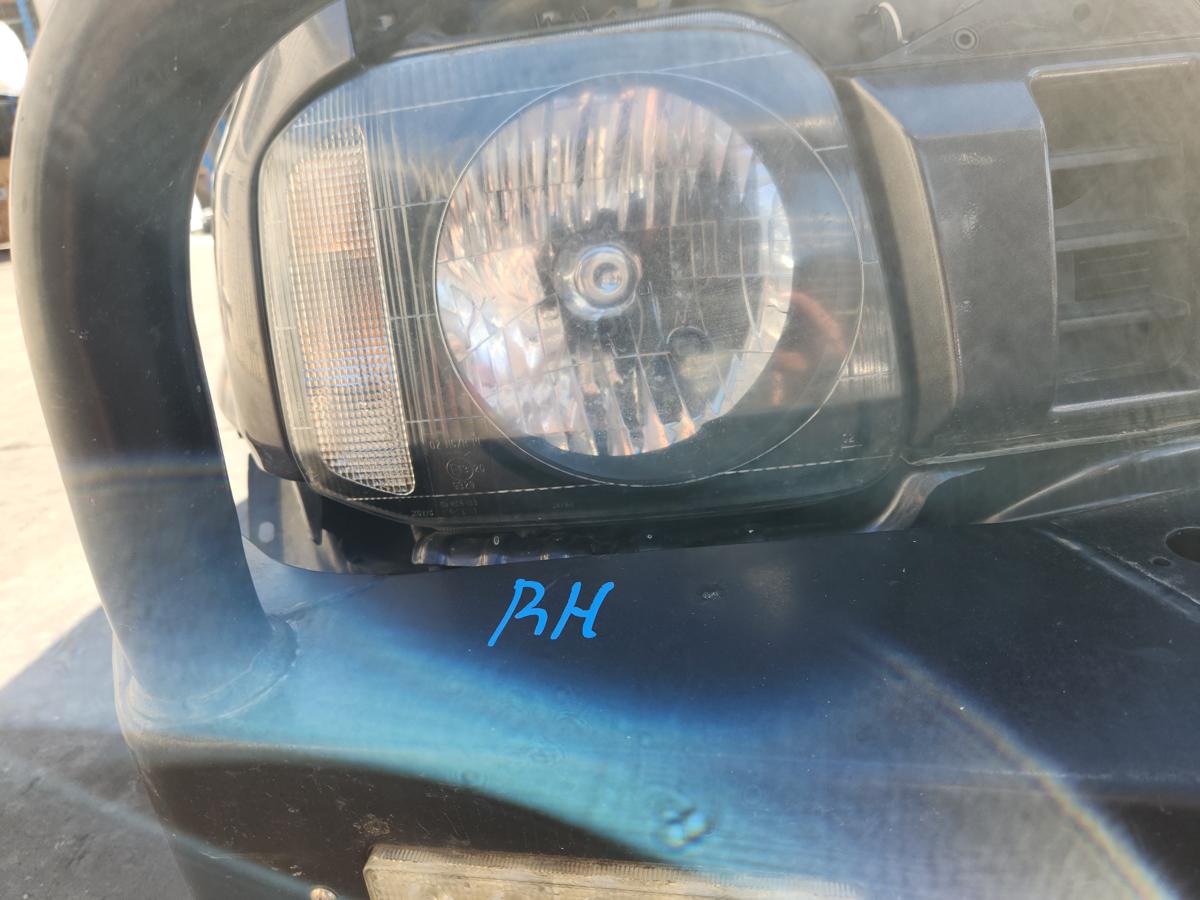 1000946303-Right Headlamp