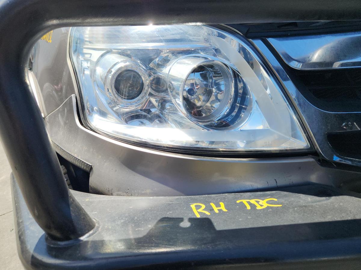 1000876916-Right Headlamp