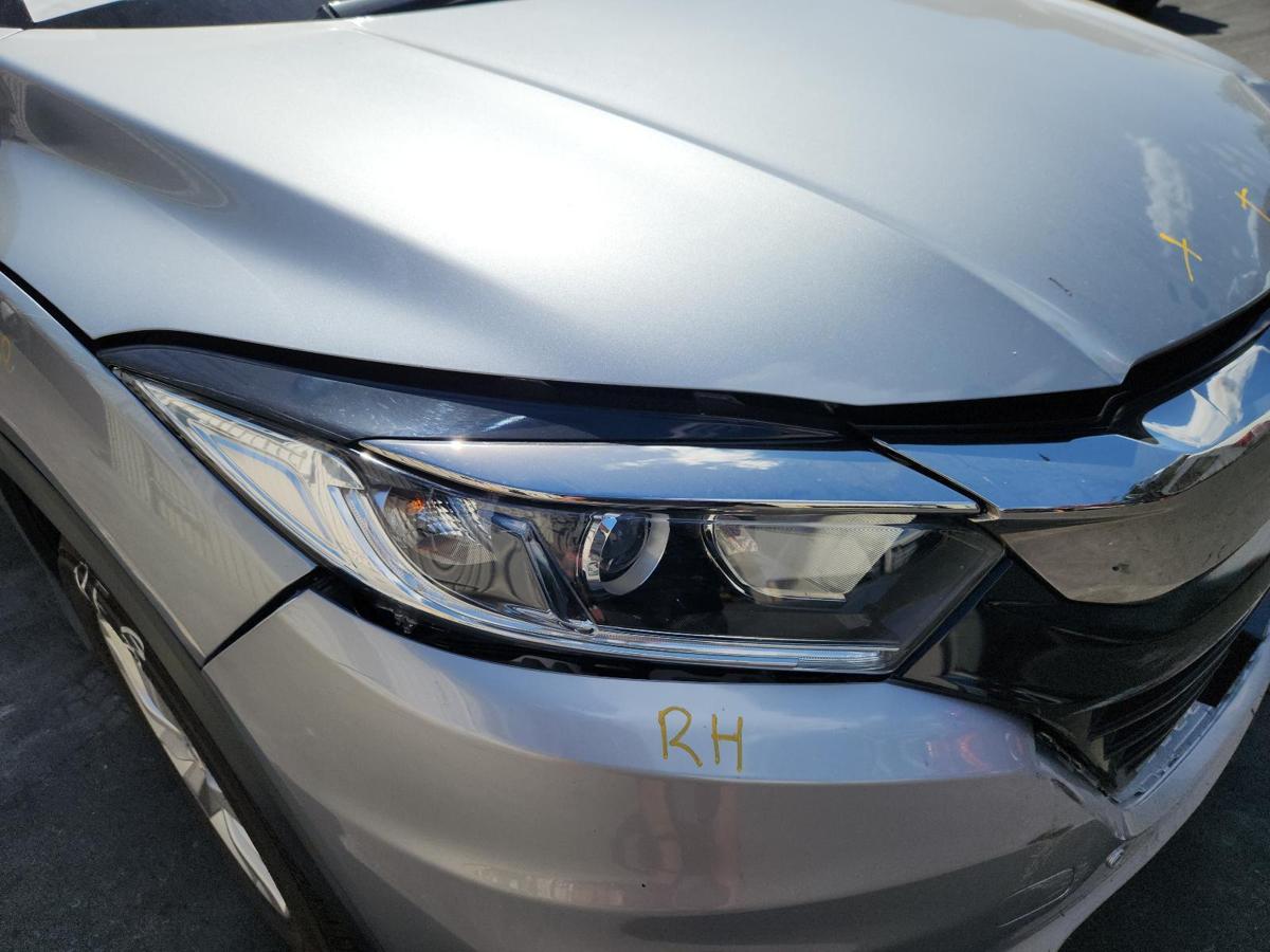 1000866311-Right Headlamp