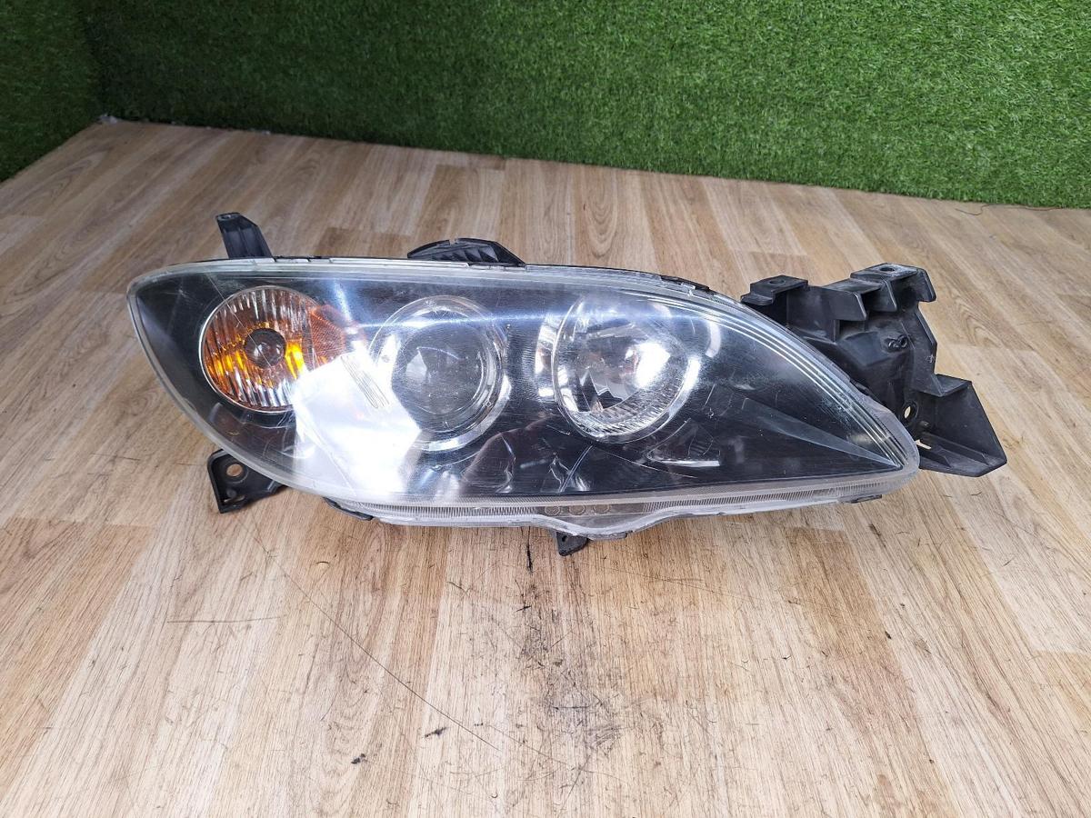1000881869-Right Headlamp Top