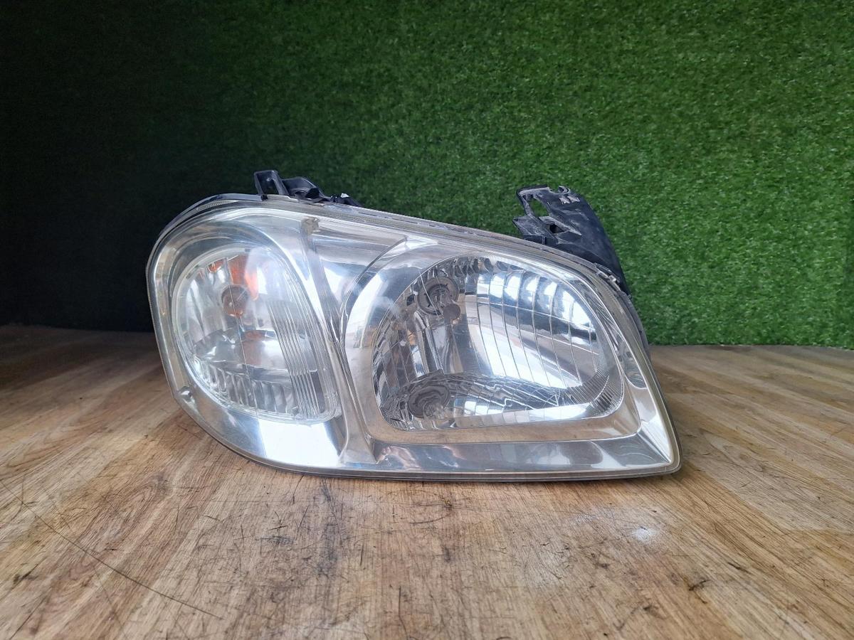 1000899279-Right Headlamp Top