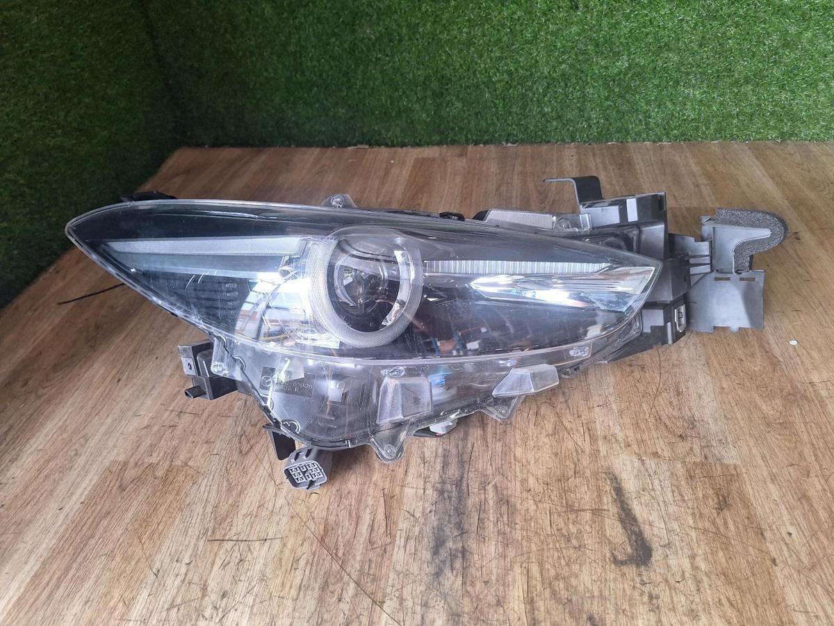 1000908121-Right Headlamp Top