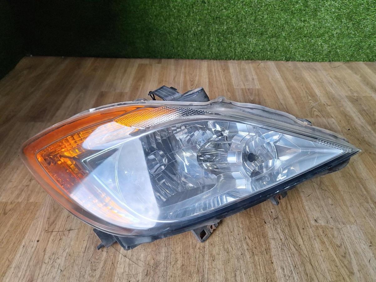 1000885061-Right Headlamp Top