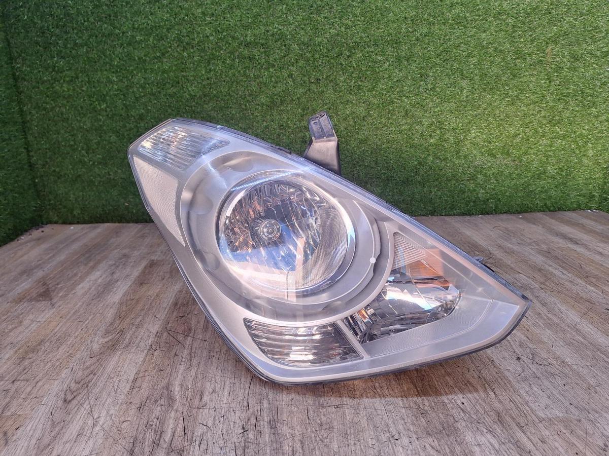 1000921891-Right Headlamp Top