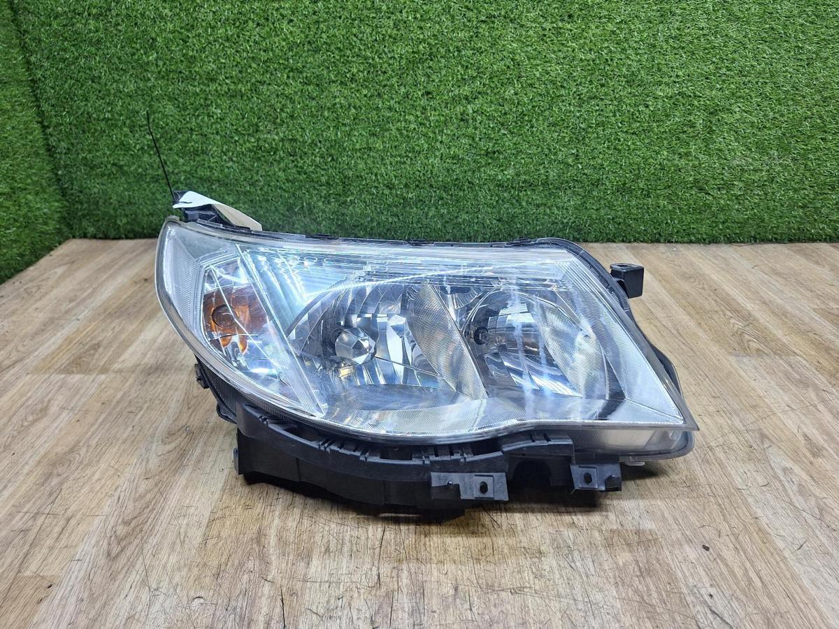1000938102-Right Headlamp Top