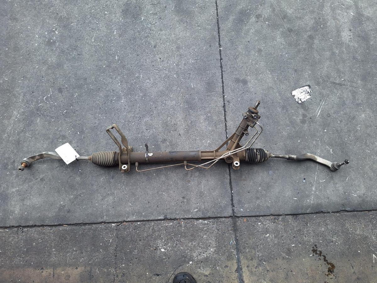 1000880079-Steering Box Rack Top