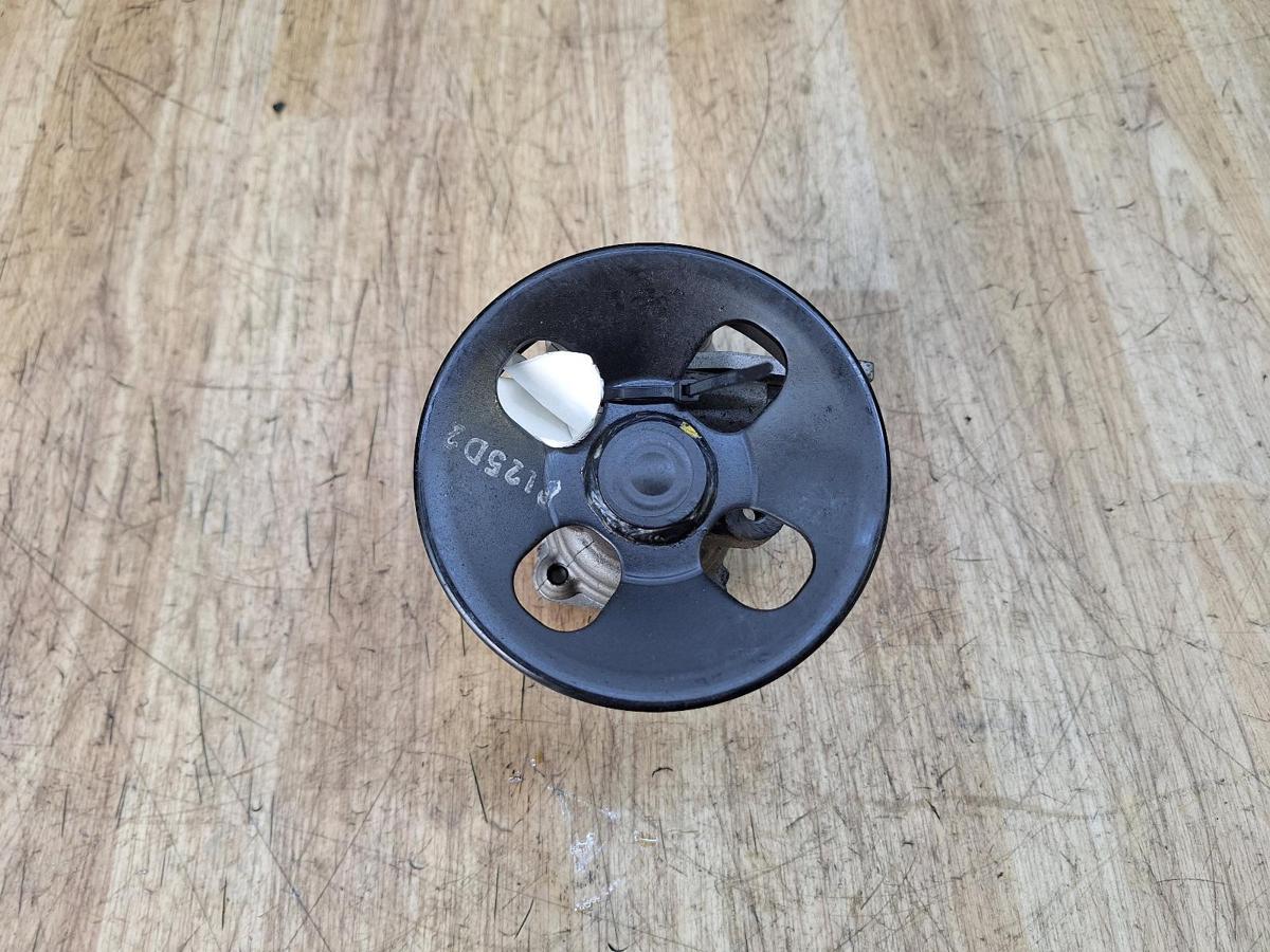 1000940387-Steering Pump Top