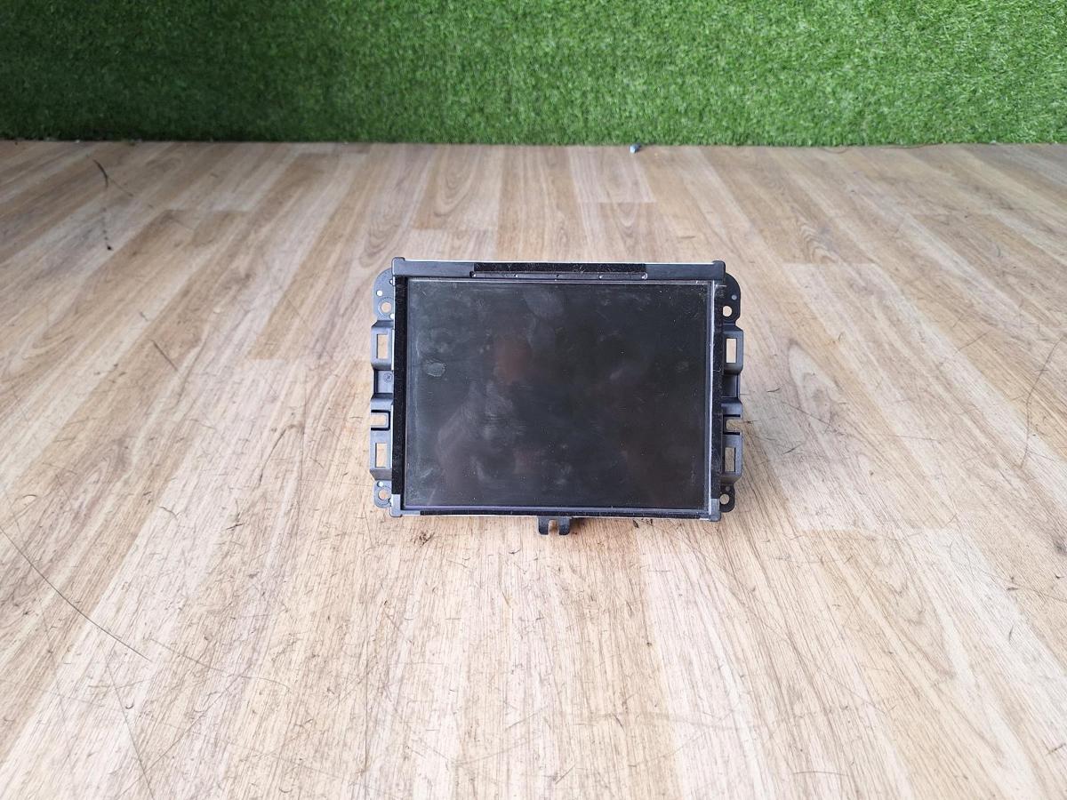 1000884777-Stereo Head Unit Front