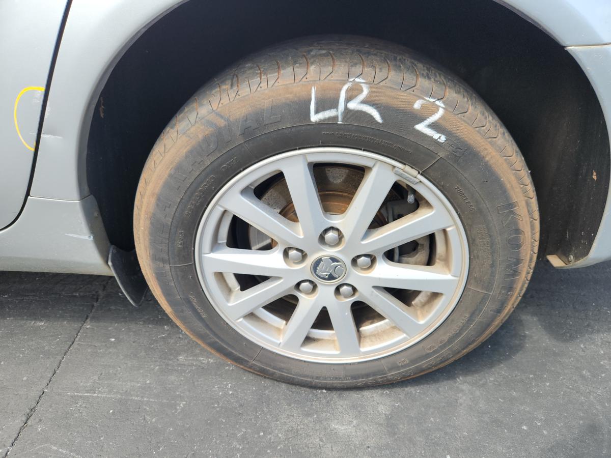 1000956305-Wheel Alloy Left Rear